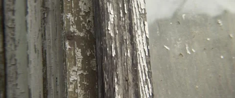 Old window frames with glass and peeled paint 5.7K scope video Stock Footage 304683697