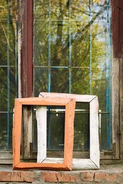 Old window with frames: A vintage scene of decay and beauty 写真素材