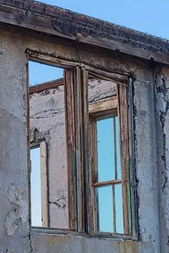An old window in the ghost town of Jerome, Arizona. Stock Photos