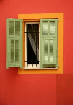 Old window with green shutters Stock Photos