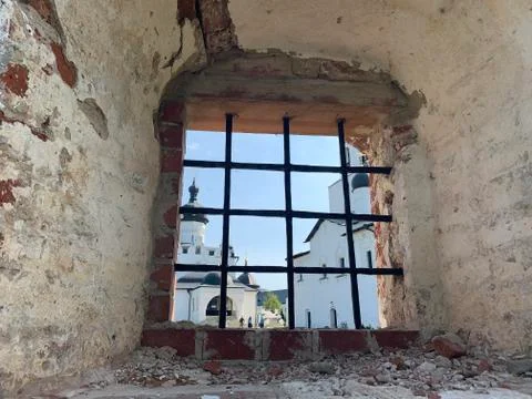 Old window with metal bars Stock Photos