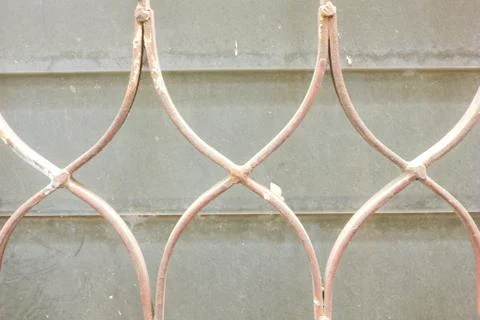 Old window with metal security bars Stock Photos