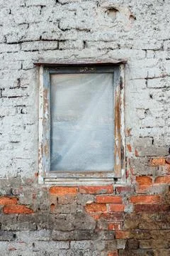 Old window on an old, distressed brick wall Stock Photos