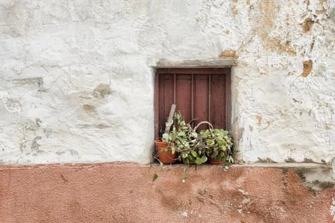 An old window of an old old kitchen in a house in a small town in Caceres, Sp Stock Photos