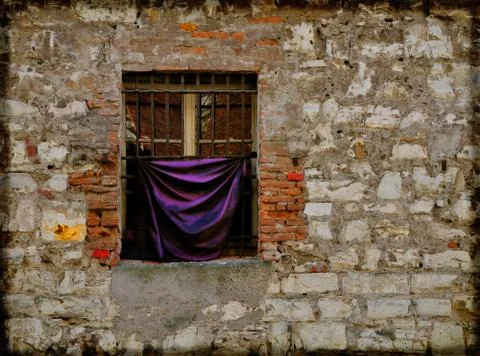 Old window with purple cloth Illustrazione stock