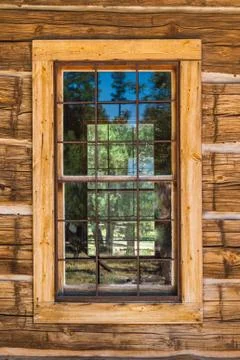 An old window on a rustic cabin Stock Photos