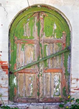 Old window with shutters closed. Stock Photos
