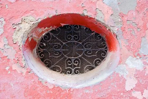 Old  window in a stone wall Stock Photos