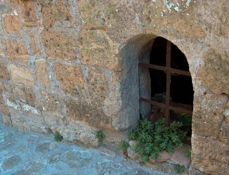 Old Window in Stone Wall. Stock Photos