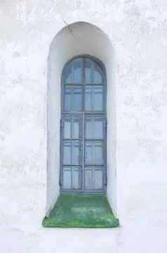 Old window on a white wall. Stock Photos