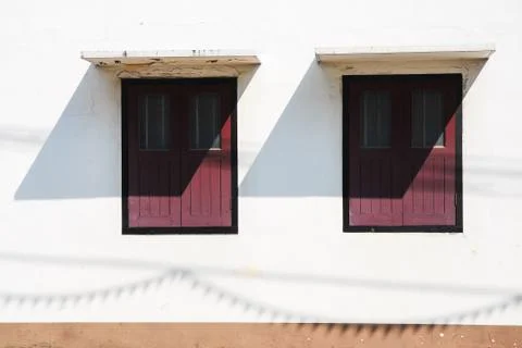 Old window on white wall Stock Photos