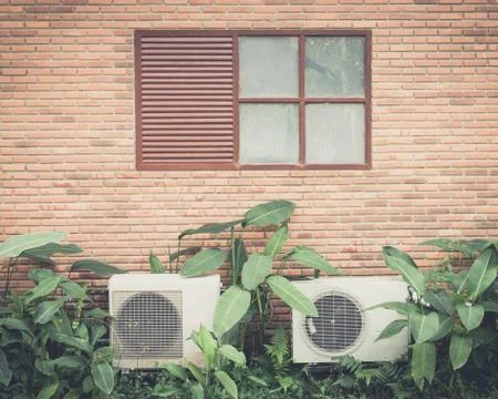 Old windows with air conditioner Stock Photos