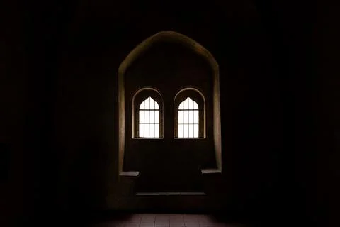 Old windows with arabic shapes in the darkness Stock Photos