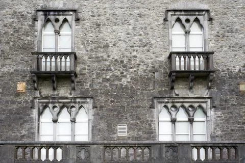 Old windows with balcony Stock Photos