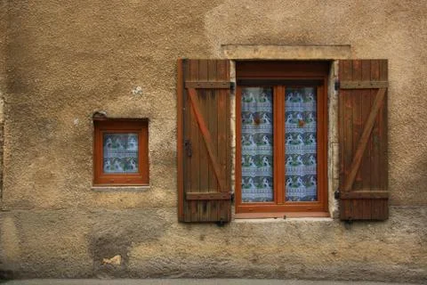 Old windows on old wall Stock Photos