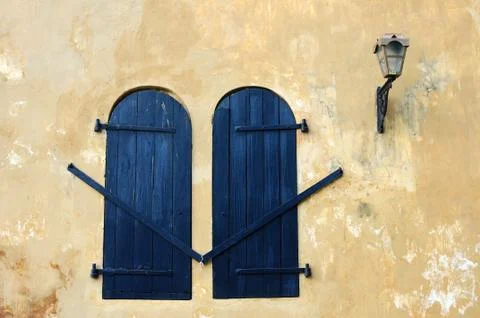 Old windows on the wall Stock Photos