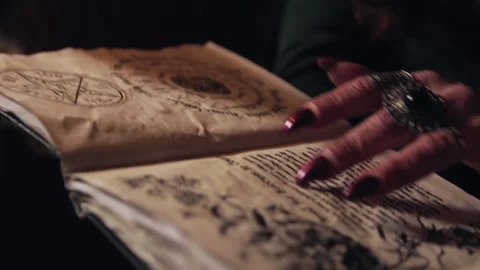 Old witch with long red nails Video stock 140571323