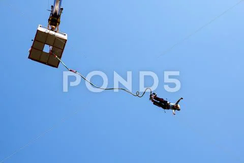 Old woman bungee jumping Stock Photos