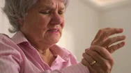 Old Woman Experiencing Arthritis Stock Footage