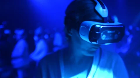 Old Woman Exploring Virtual Reality World iwith VR Headset At Tech Show Stock Footage 54937249