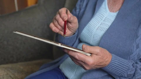 Old woman using digital tablet close up Stock Footage 315798257