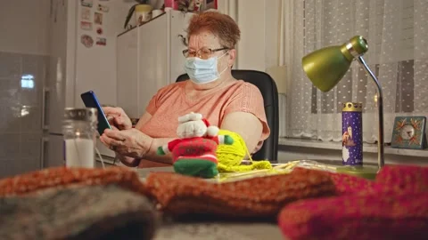 Old woman using the smartphone Stock Footage 145508089