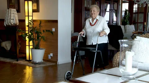Old woman with walker frame 스톡 동영상 33801422
