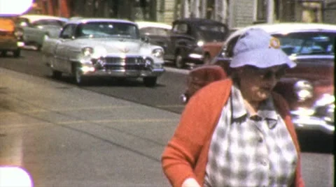 Old Woman Walks in City Street Elderly Senior 1960s Vintage Film Home Movie 1966 Stock Footage