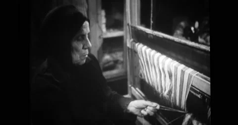 Old woman weaving in classroom Stock Footage