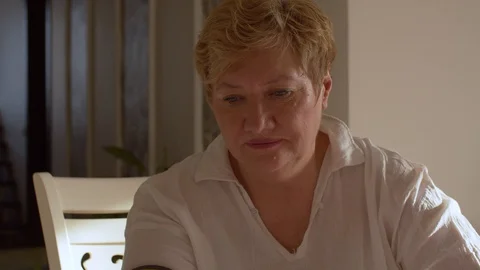 Old woman's face while measuring pressure Stock Footage 128698134