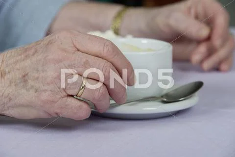 Old Woman\'s Hand Holding A Cup Of Coffee, Germany, Europe