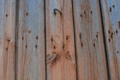 Old wood with a beautiful pattern, cracks, old brown, peach dried paint. 写真素材