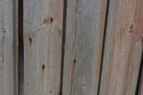 Old wood with a beautiful pattern, cracks, old brown, peach dried paint. 写真素材