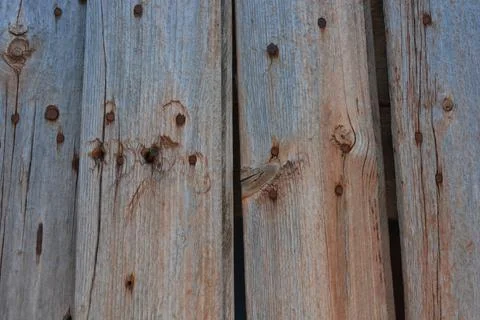 Old wood with a beautiful pattern, cracks, old brown, peach dried paint. 写真素材
