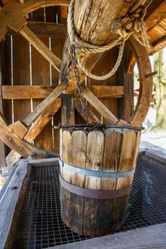 Old wood bucket, water well Stock Photos