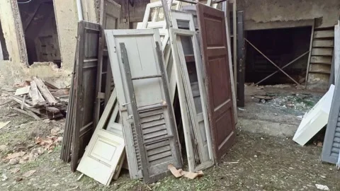 Old Wood Doors at Ruins Of Abandoned Building Stock Footage 143187953