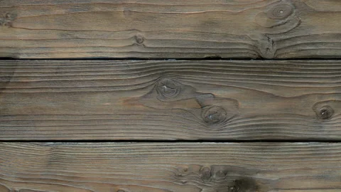 Old wood texture with knots move from right to left. Stock Footage 153668560