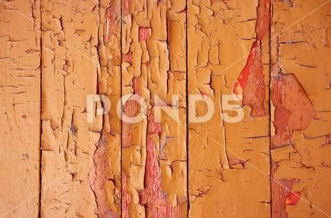 An old wooden background painted with paint with cracks, scratches and rub. Stock Photos