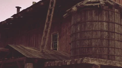 Old wooden barn and structure under a cloudy sky during the late afternoon Stock Footage 343565438