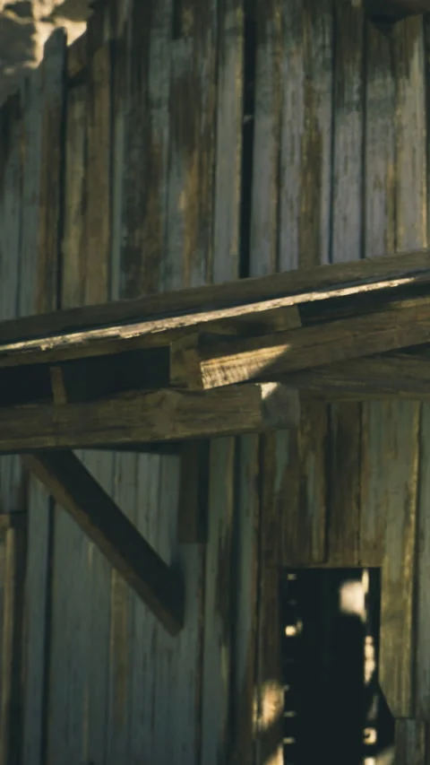 Old wooden barn with rustic charm in the warm afternoon sun Stock Footage 331840478