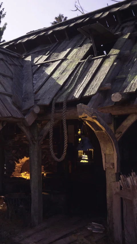 Old wooden barn with a rustic charm at dusk in a serene countryside setting Stock Footage 340080193