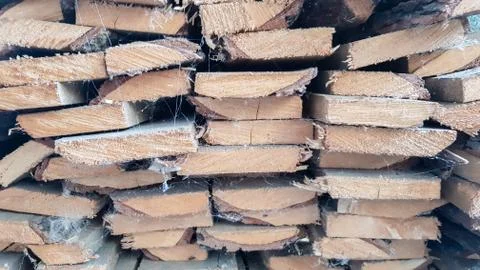 Old wooden boards piled on a stack close-up. wood texture. A pile of boards Stock Photos