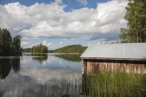 Old wooden boathouse at lake Etelä-Konnevesi at Summer, Finland Stock Photos