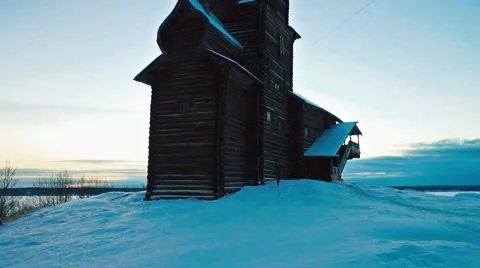 Old Wooden Church in a Snowy Winter Sunset Stock Footage 59041699