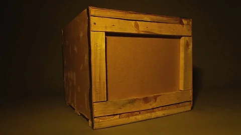 Old wooden container standing in middle of dark workshop, delivery service box 스톡 동영상 77979649
