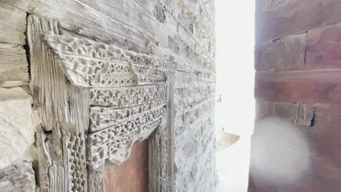 Old wooden design on the window frame of Altit Fort Hunza - Classical Stock Footage 251625595