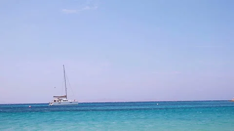 Old wooden dhow off the coast of Mykonos Stock Footage