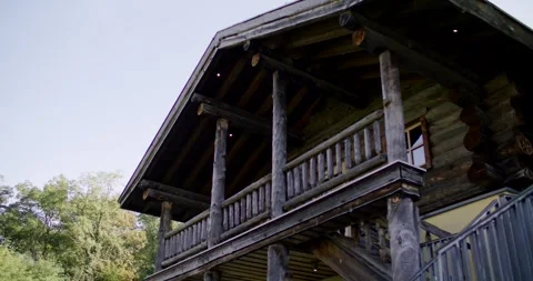 Old Wooden Hut With Balcony And Gable Roof In The Forest Stock Footage 340262471
