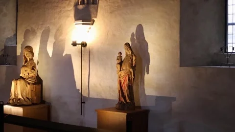 Old wooden statues displayed inside a medieval castle 4K ultra HD. Stock Footage 321182476