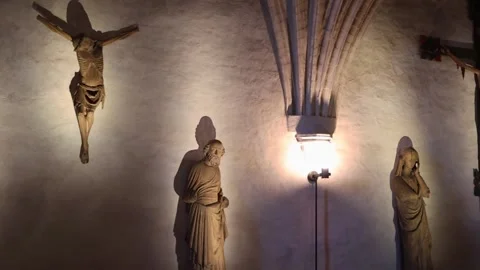 Old wooden statues displayed inside a medieval castle 4K ultra HD. Video stock 321182606